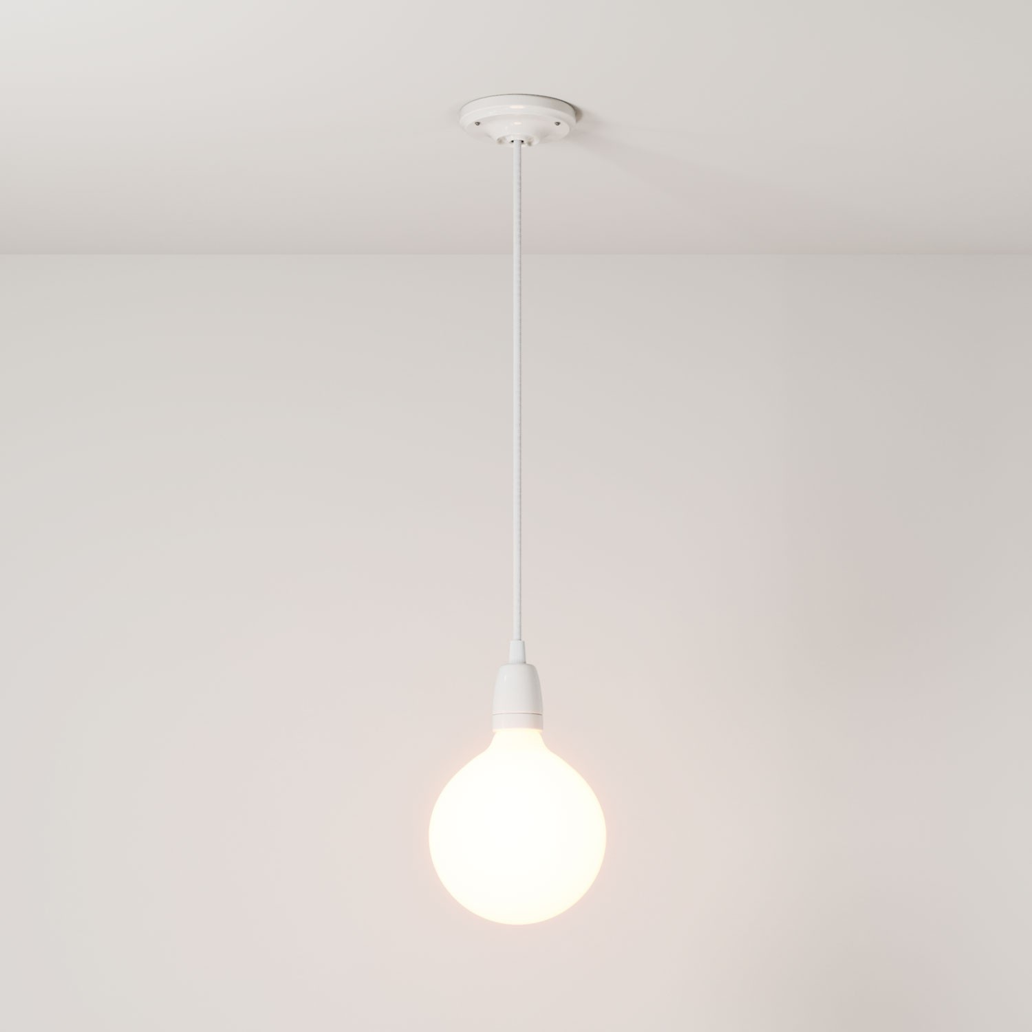 Pendant lamp with textile cable and coloured porcelain details - Made in Italy